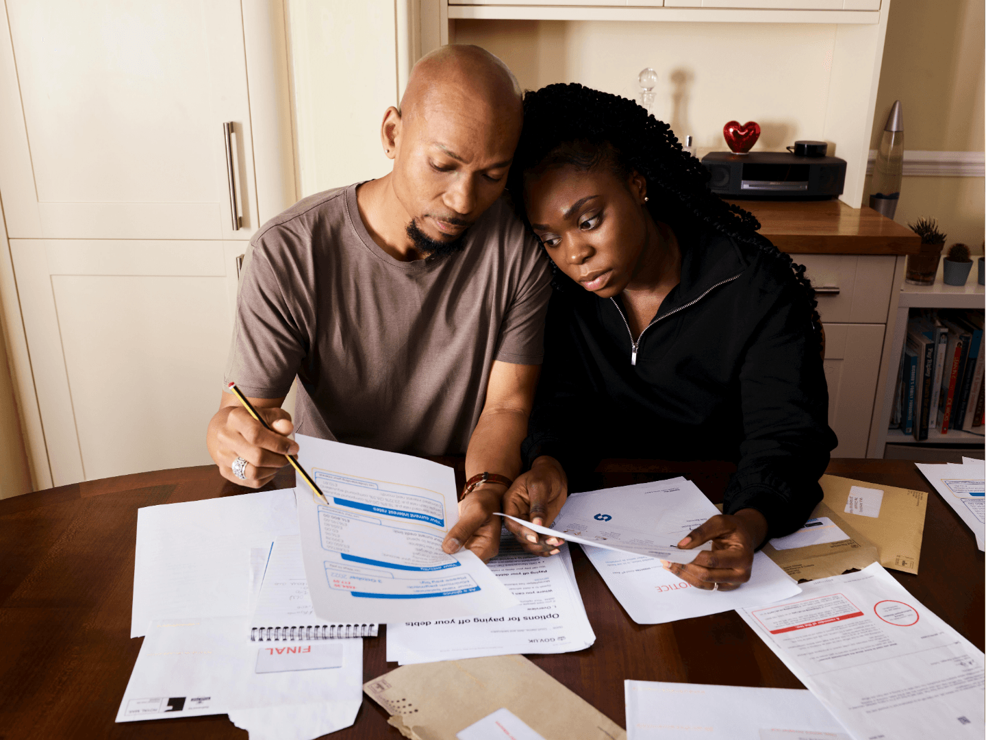 Couples reviewing document